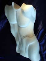 Sculpture of nude male torso carved in Cararra marble entitled 'apollo'